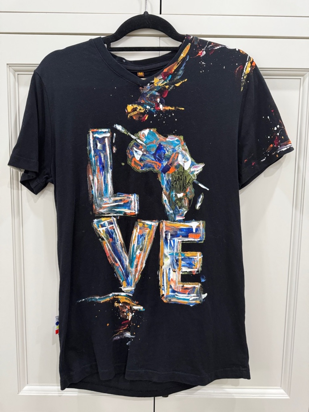 Danyaki Art Africa Love Handpainted in NY studio vibrant colors on black T-shirt